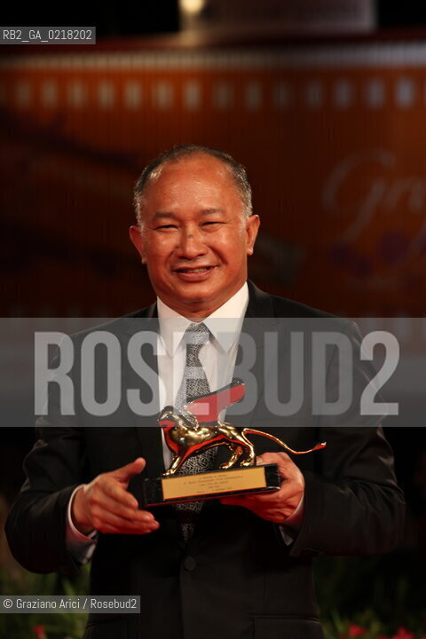 67th Venice International Film Festival - Venice September 3, 2010 - Red Carpet of the film Jianyu (Reign of Assassins) And The Golden Lion For Lifetime Achievement to John Woo. The director John Woo with the Lion