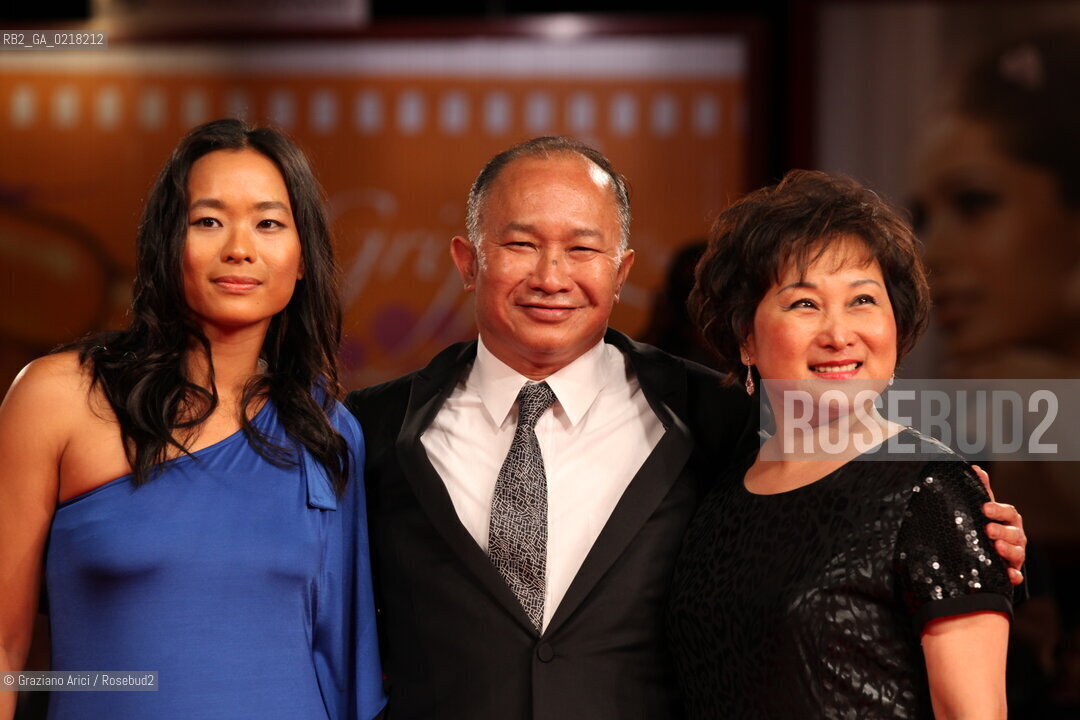 67th Venice International Film Festival - Venice September 3, 2010 - Red Carpet of the film Jianyu (Reign of Assassins) And The Golden Lion For Lifetime Achievement to John Woo. The director John Woo with actress Angeles Woo and his wife Annie Woo