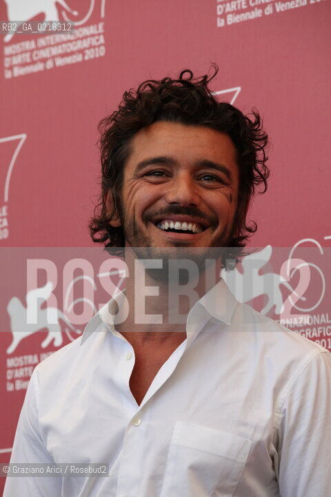 67th Venice International Film Festival - Venice September 4, 2010 - Photocall of the film A Woman - The director Michele Venitucci