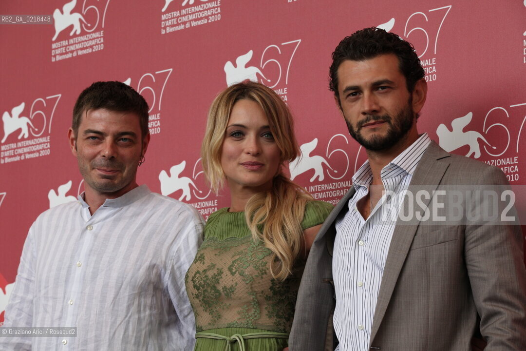 67th Venice International Film Festival - Venice September 5, 2010 - Photocall of the film 20 sigarette -  Left to right: director Aureliano Amadei, actress Carolina Crescentini and actor Vinicio Marchioni