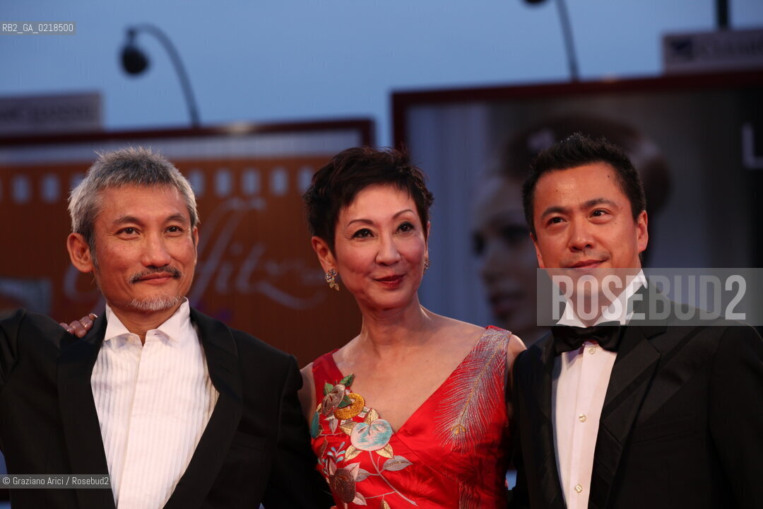 67th Venice International Film Festival - Venice September 5, 2010 - Red Carpet of the film Di Renjie Zhi Tongtian Diguo (Detective Dee and the Mystery of the Phantom Flame) - The director Tsui Hark (left) with the producers