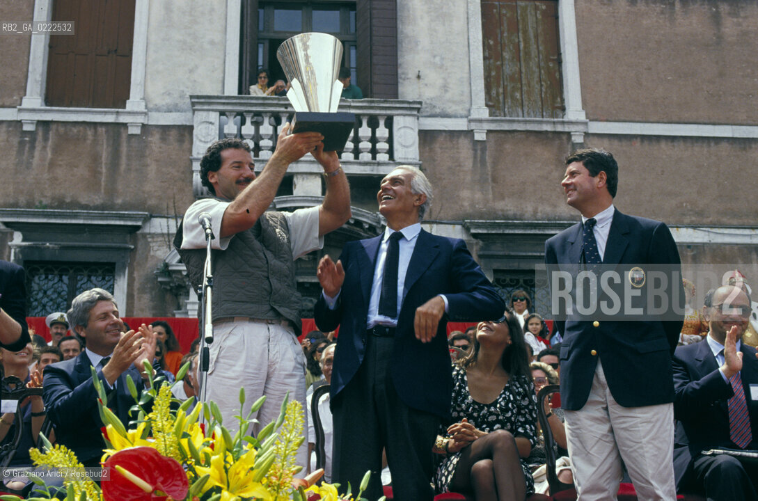 Venezia,1990.Festa Il Moro di Venezia. Il presidente della Montedison Raul Gardini e lo skipper Paul Pierre Cayard con la Coppa Louis Vuitton.  .Venice,1990.Party The Moro of Venice.The Montedison President Raul Gardini and the skipper Paul Pierre Cayard with the Coppa Louis Vuitton prize ©Graziano Arici/Rosebud2