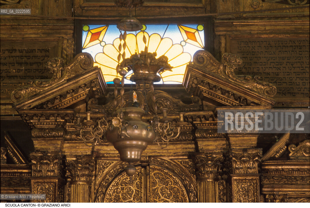 Caption: Nome:..SINAGOGA DELLA SANTA COMUNITÀ CANTON : LAMPADA - PARTICOLARE  ....Localizzazione:..VENEZIA / CANNAREGIO / CAMPO DEL GHETTO NOVO SINAGOGA DELLA SANTA COMUNITÀ CANTON / SCUOLA CANTON  ..VENICE / CANNAREGIO / CAMPO GHETTO NOVO  SYNAGOGUE OF THE SACRED COMMUNITY OF CANTON  / SCUOLA CANTON   ..Soggetto:..LAMPADA - PARTICOLARE ..LAMP  -  DETAIL    ..Cronologia:..SEC. XVI SECONDO QUARTO /1532  ..XVIth CENTURY  /1532  ..Autore:......Stile:..BAROCCO  ..BAROQUE   ..Editori Stampatori:......Committenza:..EBREI DI ORIGINE PROVENZALE DI RITO ASHKENAZITA  ..FRENCH ASHKENAZI JEWS   ..Materia e Tecnica:......Collocazione:......Note:......Riproduzione Fotografica:..Graziano Arici/Rosebud2  ....Copyright:..Graziano Arici/Rosebud2/  ....Data:..1994....Costo:..A....Key:..CHIESA  ..CHURCH