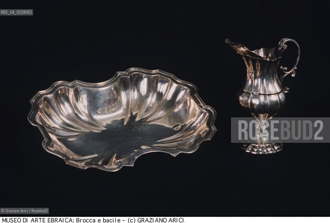 Nome:.. MUSEO DI ARTE EBRAICA : BROCCA  E BACILE..   ..Localizzazione:..VENEZIA / CANNAREGIO / CAMPO DEL GHETTO NOVO 2902/B / MUSEO DI ARTE EBRAICA  ..VENICE / CANNAREGIO / CAMPO GHETTO NOVO  2902/B / THE MUSEUM OF JEWISH ART     ..Soggetto:..BROCCA / BACILE  ..JUG / WASHBASIN  ..Cronologia:..SEC.XVIII FINE  ..XVIIIth CENTURY    ..Autore:..GENTILOMO LAUDADIO 1781 - 1856 (BACILE)  ..GENTILOMO LAUDADIO 1781 - 1856 (WASHBASIN)  ..Stile:......Editori Stampatori:......Committenza:......Materia e Tecnica:..ARGENTO  ..SILVER   ..Collocazione:......Note:......Riproduzione Fotografica:  ..Graziano Arici/Rosebud2 ....Copyright:..Graziano Arici/Rosebud2/....Data:..1994 ....Costo:..A....Key:..MUSEI  OGGETTI   ..MUSEUMS  OBJECTS ..