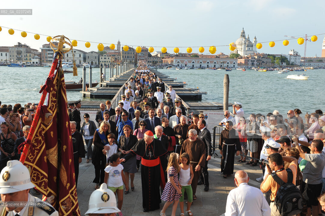Venice 16/7/11 - The cardinal Angelo Scola over the Boat-Bridge in Giudecca Canal for the Redentore Feast festa fuochi dartificio ©Graziano Arici/Rosebud2
