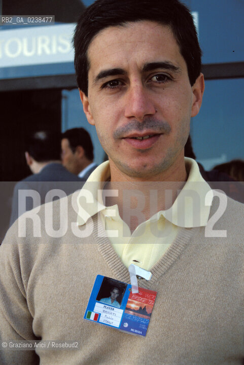 - Casinò del Lido di Venezia 1991.Olimpiade del bridge. Il giocatore Fabio Rosati. Gioco giocatore bridge Olimpiadi.-  Lido of Venice 1991.Bridgès Olympics. Portrait of Fabio Rosati, games-player  ©Graziano Arici/Rosebud2
