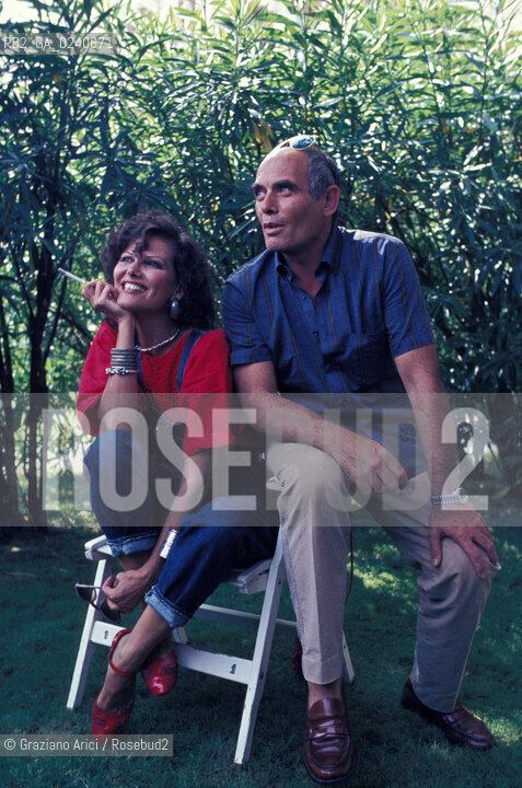 - Venezia, 1987. 44°Festival Internazionale dArte Cinematografica di Venezia.Ritratto dellattrice Claudia Cardinale insieme al marito Pasquale Squitieri . Cinema ritratto attrice coppia regista.- Venice,1987. 44th Venice International Film Festival.Portrait of the actress Claudia Cardinale with her husband, the director Pasquale Squitieri  MES ©  Graziano Arici