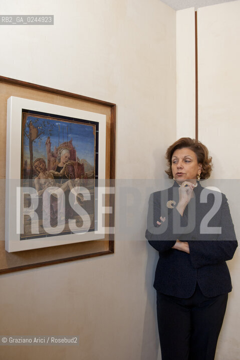 Venice 14/10/11 - The Director of Venice Museums Doundation Gabriella Belli in Correr Museum - La Direttrice della Fondazione dei musei Civici di Venezia nel Museo Correr con il quadro Gesu e la Madonna: Deposizione di Cosmè Tura arte ©Graziano Arici/Rosebud2