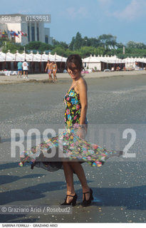 - Venezia,1992.Festival Internazionale dArte Cinematografica di Venezia.Ritratto dellattrice Sabrina Ferilli Cinema ritratto attrice spiaggia Lido Excelsior - Venice,1992.Venice International Film Festival.Portrait of the actress Sabrina Ferilli on the beach ©Graziano Arici/Rosebud2