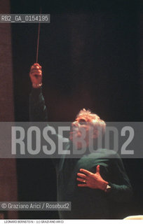 -Venezia,1985.Ritratto del direttore dorchestra Leonard Bernstein a Venezia mentre dirige. Musica classica direttore orchestra ritratto concerto.-Venice,1985.Portrait of the conductor Leonard Bernstein ©Graziano Arici/Rosebud2