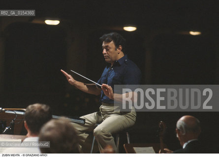 -Venice,1990. Ritratto del direttore dorchestra Zubin Mehta durante un concerto.  Musica Classica Direttore Orchestra ritratto .-Venice,1990. Portrait of the conductor Zubin Mehta during a concert ©Graziano Arici/Rosebud2