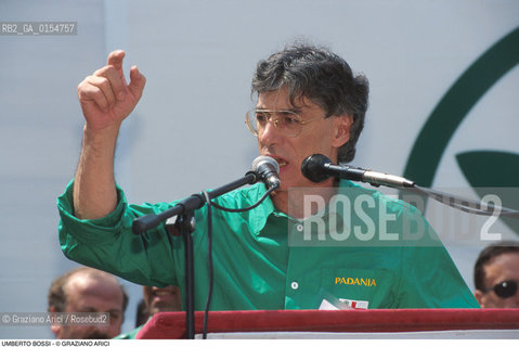 Venezia,1997.Il politico leader e fondatore della Lega Nord Umberto Bossi durante il comizio della Lega Nord. Politica politico Lega Nord ritratto comizio incontro camicia verde Segretario partito.Venice,1997.The politician Umberto Bossi, leader of the Lega Nord Party ©Graziano Arici/Rosebud2