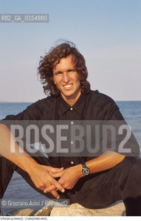 Venezia,1992.Ritratto dello sportivo Stefan Glowacz,arrampicatore Sport arrampicata libera roccia ritratto spiaggia mare.Venice,1992.Portrait of the rock climber Stefan Glowacz  ©Graziano Arici/Rosebud2