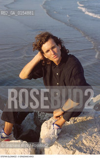Venezia,1992.Ritratto dello sportivo Stefan Glowacz,arrampicatore Sport arrampicata libera roccia ritratto spiaggia mare.Venice,1992.Portrait of the rock climber Stefan Glowacz  ©Graziano Arici/Rosebud2