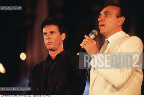 Venezia,1993.Ritratto del conduttore Pippo Baudo insieme al cantante Claudio Baglioni. Musica televisione cantante leggera pop conduttore presentatore ritratto.Venice,1993.Portrait of the tv presenter Pippo Baudo and the singer Claudio Baglioni ©Graziano Arici/Rosebud2