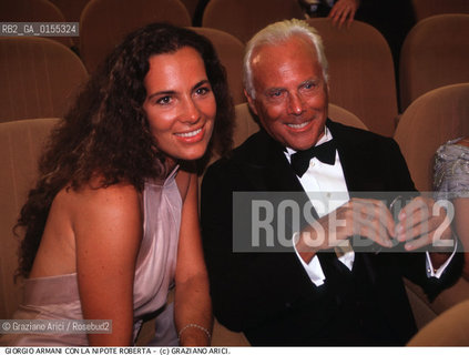 - Venezia, 1998. 55°Festival Internazionale dArte Cinematografica di Venezia.Ritratto dello stilista Giorgio Armani con la nipote Roberta.  Cinema moda stilista ritratto.- Venice,1998. 55th Venice International Film Festival.Portrait of the fashion stylist Giorgio Armani with his niece Roberta  ©Graziano Arici/Rosebud2