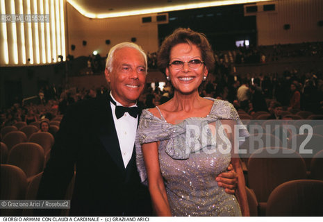 - Venezia, 1998. 55°Festival Internazionale dArte Cinematografica di Venezia.Ritratto dello stilista Giorgio Armani con lattrice Claudia Cardinale.  Cinema moda stilista ritratto attrice .- Venice,1998. 55th Venice International Film Festival.Portrait of the fashion stylist Giorgio Armani with the actress Claudia Cardinale  ©Graziano Arici/Rosebud2