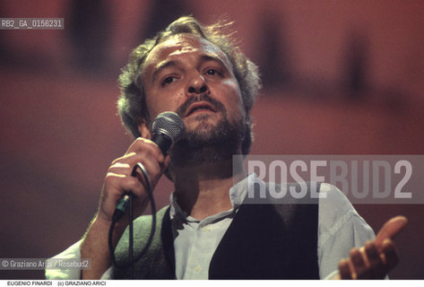 Venezia,1996.Ritratto del cantautore Eugenio Finardi.Musica cantante ritratto folk cantautore cappello chitarra -Venice,1996. Portrait of the singer and songwriter Eugenio Finardi ©Graziano Arici/Rosebud2