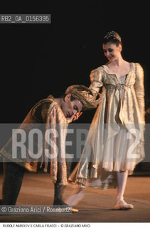 -Venezia,1985.Gran Teatro La Fenice.Balletto con Carla Fracci e Rudolf Nureyev.Rudolf Nureyev e Carla Fracci sul palco durante il balletto.  danza ballerino balletto ritratto classica.-Venice,1985.Gran Teatro La Fenice.The dancer Carla Fracci with Rudolf Nureyev  ©Graziano Arici/Rosebud2 .La cessione dei diritti di questa immagine si intende per quanto di nostra competenza. Non comprende invece le eventuali spese  relative a diritti che potranno essere richiesti dagli Enti o persone fisiche cui appartengono eventualmente i soggetti  ripresi. Tali costi, ove necessari, e l’espletamento di qualsivoglia pratica di richiesta di concessione del permesso di pubblicazione sono esclusivamente a carico e a cura del soggetto acquirente di questa immagine.