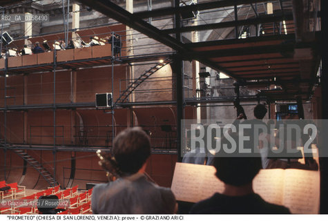 -Venezia,1984.Chiesa di San Lorenzo. Opera del compositore contemporaneo Luigi Nono, Prometeo - Tragedia dellascolto prova generale, testo di Massimo Cacciari, struttura scenica dellarchitetto Renzo Piano, luci del pittore Emilio Vedova.Il compositore Luigi Nono durante le prove. musica compositore opera Prometeo contemporanea elettronica filosofia architettura pittura ritratto.-Venice,1984. Work  Prometeo - Tragedia dellascolto directed by contemporary composer Luigi Nono,text by the philosopher Massimo Cacciari,scenography by the architect Renzo Piano,stage lighting by the painter Emilio Vedova. Portrait of the composer Luigi Nono ©Graziano Arici/Rosebud2