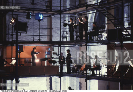 -Venezia,1984.Chiesa di San Lorenzo. Opera del compositore contemporaneo Luigi Nono, Prometeo - Tragedia dellascolto prova generale, testo di Massimo Cacciari, struttura scenica dellarchitetto Renzo Piano, luci del pittore Emilio Vedova.Il compositore Luigi Nono durante le prove. musica compositore opera Prometeo contemporanea elettronica filosofia architettura pittura ritratto.-Venice,1984. Work  Prometeo - Tragedia dellascolto directed by contemporary composer Luigi Nono,text by the philosopher Massimo Cacciari,scenography by the architect Renzo Piano,stage lighting by the painter Emilio Vedova. Portrait of the composer Luigi Nono ©Graziano Arici/Rosebud2