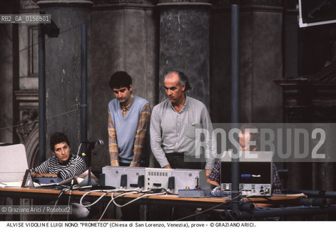 -Venezia,1984.Chiesa di San Lorenzo. Opera del compositore contemporaneo Luigi Nono, Prometeo - Tragedia dellascolto prova generale, testo di Massimo Cacciari, struttura scenica dellarchitetto Renzo Piano, luci del pittore Emilio Vedova.Il compositore Luigi Nono durante le prove. musica compositore opera Prometeo contemporanea elettronica filosofia architettura pittura ritratto.-Venice,1984. Work  Prometeo - Tragedia dellascolto directed by contemporary composer Luigi Nono,text by the philosopher Massimo Cacciari,scenography by the architect Renzo Piano,stage lighting by the painter Emilio Vedova. Portrait of the composer Luigi Nono ©Graziano Arici/Rosebud2