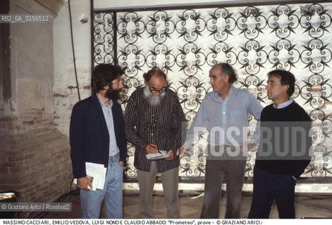 -Venezia,1984.Chiesa di San Lorenzo. Opera del compositore contemporaneo Luigi Nono, Prometeo - Tragedia dellascolto prova generale, testo di Massimo Cacciari, struttura scenica dellarchitetto Renzo Piano, luci del pittore Emilio Vedova.Il compositore Luigi Nono durante le prove con Massimo Cacciari,Emilio Vedova e Claudio Abbado. musica compositore opera Prometeo contemporanea elettronica filosofia architettura pittura ritratto.-Venice,1984. Work  Prometeo - Tragedia dellascolto directed by contemporary composer Luigi Nono,text by the philosopher Massimo Cacciari,scenography by the architect Renzo Piano,stage lighting by the painter Emilio Vedova. Portrait of the composer Luigi Nono with  Massimo Cacciari,Emilio Vedova and Claudio Abbado ©Graziano Arici/Rosebud2