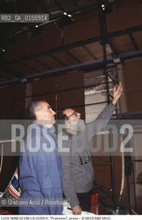 -Venezia,1984.Chiesa di San Lorenzo. Opera del compositore contemporaneo Luigi Nono, Prometeo - Tragedia dellascolto prova generale, testo di Massimo Cacciari, struttura scenica dellarchitetto Renzo Piano, luci del pittore Emilio Vedova.Il compositore Luigi Nono durante le prove con il pittore Emilio Vedova. musica compositore opera Prometeo contemporanea elettronica filosofia architettura pittura ritratto.-Venice,1984. Work  Prometeo - Tragedia dellascolto directed by contemporary composer Luigi Nono,text by the philosopher Massimo Cacciari,scenography by the architect Renzo Piano,stage lighting by the painter Emilio Vedova. Portrait of the composer Luigi Nono with the painter Emilio Vedova ©Graziano Arici/Rosebud2