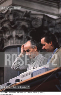 -Venezia,1984.Chiesa di San Lorenzo. Opera del compositore contemporaneo Luigi Nono, Prometeo - Tragedia dellascolto prova generale, testo di Massimo Cacciari, struttura scenica dellarchitetto Renzo Piano, luci del pittore Emilio Vedova.Il compositore Luigi Nono durante le prove. musica compositore opera Prometeo contemporanea elettronica filosofia architettura pittura ritratto.-Venice,1984. Work  Prometeo - Tragedia dellascolto directed by contemporary composer Luigi Nono,text by the philosopher Massimo Cacciari,scenography by the architect Renzo Piano,stage lighting by the painter Emilio Vedova. Portrait of the composer Luigi Nono ©Graziano Arici/Rosebud2