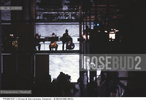 -Venezia,1984.Chiesa di San Lorenzo. Opera del compositore contemporaneo Luigi Nono, Prometeo - Tragedia dellascolto prova generale, testo di Massimo Cacciari, struttura scenica dellarchitetto Renzo Piano, luci del pittore Emilio Vedova.Il compositore Luigi Nono durante le prove. musica compositore opera Prometeo contemporanea elettronica filosofia architettura pittura ritratto.-Venice,1984. Work  Prometeo - Tragedia dellascolto directed by contemporary composer Luigi Nono,text by the philosopher Massimo Cacciari,scenography by the architect Renzo Piano,stage lighting by the painter Emilio Vedova. Portrait of the composer Luigi Nono ©Graziano Arici/Rosebud2