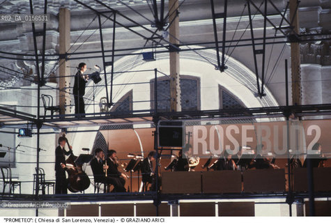 -Venezia,1984.Chiesa di San Lorenzo. Opera del compositore contemporaneo Luigi Nono, Prometeo - Tragedia dellascolto prova generale, testo di Massimo Cacciari, struttura scenica dellarchitetto Renzo Piano, luci del pittore Emilio Vedova.Il compositore Luigi Nono durante le prove. musica compositore opera Prometeo contemporanea elettronica filosofia architettura pittura ritratto.-Venice,1984. Work  Prometeo - Tragedia dellascolto directed by contemporary composer Luigi Nono,text by the philosopher Massimo Cacciari,scenography by the architect Renzo Piano,stage lighting by the painter Emilio Vedova. Portrait of the composer Luigi Nono ©Graziano Arici/Rosebud2