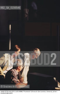 -Venezia,1984.Chiesa di San Lorenzo. Opera del compositore contemporaneo Luigi Nono, Prometeo - Tragedia dellascolto prova generale, testo di Massimo Cacciari, struttura scenica dellarchitetto Renzo Piano, luci del pittore Emilio Vedova.Il compositore Luigi Nono durante le prove con Hans Peter Haller. musica compositore opera Prometeo contemporanea elettronica filosofia architettura pittura ritratto.-Venice,1984. Work  Prometeo - Tragedia dellascolto directed by contemporary composer Luigi Nono,text by the philosopher Massimo Cacciari,scenography by the architect Renzo Piano,stage lighting by the painter Emilio Vedova. Portrait of the composer Luigi Nono with Hans Peter Haller ©Graziano Arici/Rosebud2