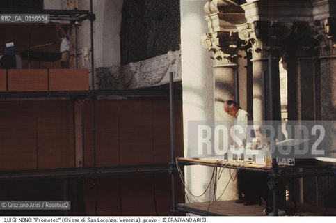 -Venezia,1984.Chiesa di San Lorenzo. Opera del compositore contemporaneo Luigi Nono, Prometeo - Tragedia dellascolto prova generale, testo di Massimo Cacciari, struttura scenica dellarchitetto Renzo Piano, luci del pittore Emilio Vedova.Il compositore Luigi Nono durante le prove. musica compositore opera Prometeo contemporanea elettronica filosofia architettura pittura ritratto.-Venice,1984. Work  Prometeo - Tragedia dellascolto directed by contemporary composer Luigi Nono,text by the philosopher Massimo Cacciari,scenography by the architect Renzo Piano,stage lighting by the painter Emilio Vedova. Portrait of the composer Luigi Nono ©Graziano Arici/Rosebud2