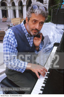 Nome:.PIOVANI NICOLA.Descrizione:.CINEMA MUSICA COMPOSITORE AL PIANOFORTE.Credit:.©Graziano Arici/Rosebud2 Costo:.A.Nazione:.ITALIA.Cittˆ:..Data:.1999.