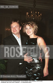 Nome:.WINSLET KATE.Descrizione:.CINEMA ATTRICE CON IL MARITO JIM / MOSTRA DEL CINEMA.Credit:.©Graziano Arici/Rosebud2 Costo:.A.Nazione:.USA.Cittˆ:..Data:.1999.