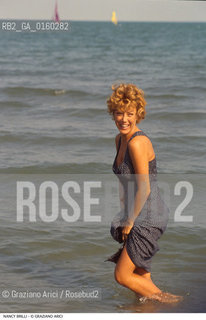 Caption: Nome: .BRILLI NANCY.Descrizione: .CINEMA TEATRO ATTRICE/NEL MARE.Credit: ©Graziano Arici/Rosebud2 / Costo: .A.Nazione: .ITALIA.Cittˆ: ..Data: .1993