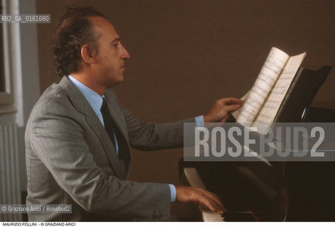 Caption: Nome: .POLLINI MAURIZIO.Descrizione: .MUSICA CLASSICA PIANISTA/AL PIANOFORTE CON SPARTITO.Credit: ©Graziano Arici/Rosebud2 / Costo: .A.Nazione: .ITALIA.Cittˆ: ..Data: .1992