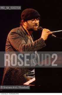 Caption: Nome: .DALLA LUCIO.Descrizione: .MUSICA POP CANTAUTORE/CON CAPPELLO.Credit: ©Graziano Arici/Rosebud2 / Costo: .A.Nazione: .ITALIA.Cittˆ: ..Data: .1988