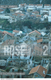Nome: .MOSTAR.Descrizione: .GUERRA EX JUGOSLAVIA / DALLALTO CASE DISTRUTTE.Credit: ©Graziano Arici/Rosebud2 Costo: ..Nazione: .BOSNIA.Cittˆ: ..Data: .1994..