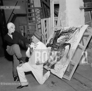 THE PAINTER SALVADOR DALI WITH THE SCENOGRAPHY OF THE COMEDY  LA DAMA SPAGNOLA E IL CAVALIERE ROMANO   AT THE THEATRE  LA FENICE  IN VENICE WITH THE DANCER LUDMILLA TCHERINA - 1961 - © ARCHIVIO Graziano Arici/Rosebud2  / ARTE / FENICE / BALLERINA /