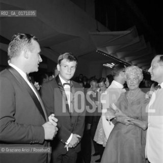 THE ART COLLECTOR PEGGY GUGGENHEIM AT INTERNATIONAL FILM FESTIVAL WITH THE ACTOR JAQUES PERRIN AND THE DIRECTOR VALERIO ZURLINI - VENICE - 1960 - © ARCHIVIO Graziano Arici/Rosebud2  / ARTE / COLLEZIONISTA / MOSTRA DEL CINEMA