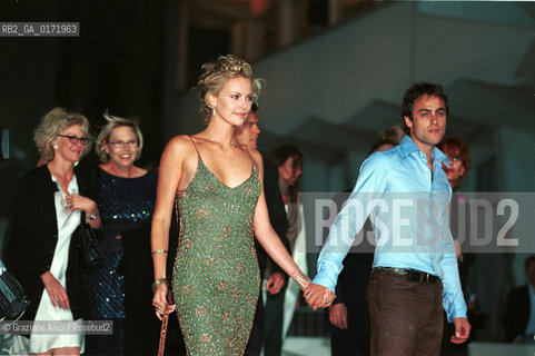 01/09 - VENICE - 58.INTERNATIONAL FILM FESTIVAL - THE ACTRESS  CHARLIZE THERON WITH HER BOYFRIEND - THE CURSE OF THE JADE SCORPION - ©Graziano Arici/Rosebud2