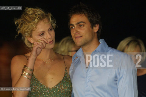 01/09 - VENICE - 58.INTERNATIONAL FILM FESTIVAL - THE ACTRESS  CHARLIZE THERON WITH HER BOYFRIEND  - THE CURSE OF THE JADE SCORPION - ©Graziano Arici/Rosebud2