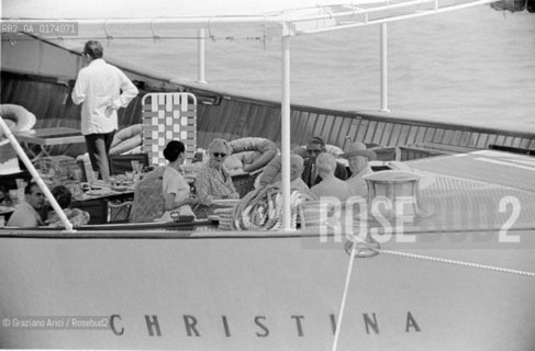 THE SHIP BUILDER ARISTOTELIS ONASSIS AND THE STATESMAN WINSTON CHURCHILL WITH HIS WIFE ON THE YACHT  CHRISTINA  IN VENICE - 1960 © ARCHIVIO Graziano Arici/Rosebud2  /  ECONOMIA / POLITICA / PANFILO / ARMATORE