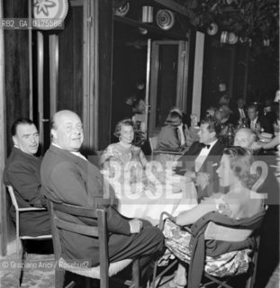 BARBARA HUTTONS PARTY IN LOCANDA CIPRIANI IN TORCELLO (VENICE) : THE SHIPBUILDER OLIVIERO TRIPOVICH WITH HIS WIFE LUCIETTA, THE COUNT VETTOR MARCELLO AND TASSILO VON FURSTENBERG - 1957  - © ARCHIVIO Graziano Arici/Rosebud2  / NOBILE / NOBILTA / CONTE / ARMATORE /