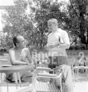 THE PRODUCERS GIUSEPPE AMATO AND SIMON SHIFFRIN AT VENICE LIDO - 1960 - © ARCHIVIO Graziano Arici/Rosebud2  / CINEMA / PRODUTTORE