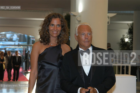 29/08/02 - 59. INTERNATIONAL FILM FESTIVAL IN VENICE LIDO :   THE FASHION STYLIST GIORGIO ARMANI WITH HER NEPHEW ROBERTA   - © 2002 - Graziano Arici/Rosebud2 -  MOSTRA DEL CINEMA / STILISTA