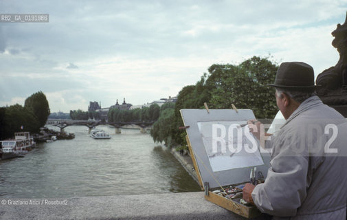 ( FRANCIA  )  PARIGI : PITTORE E IL FIUME SENNA © 1995 Graziano Arici/Rosebud2 / GEO .