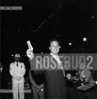 THE TOMBOLA GAME IN ST.MARKSS SQUARE - VENICE - 196? © ARCHIVIO Graziano Arici/Rosebud2  / GIOCO DELLA TOMBOLA IN PIAZZA S.MARCO