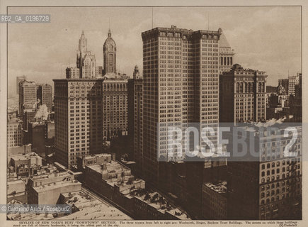 NEW YORK - USA - 1905 (?) SKYLINE OF NEW YORK S BUSY DOWNTOWN SECTION THE TRHEE TOWERS FROM LEFT TO RIGHT ARE: WOOLWORTH, SINGER, BANKERS TRUST BUILDINGS  SKYSCRAPER ©Graziano Arici/Rosebud2 GRATTACIELO